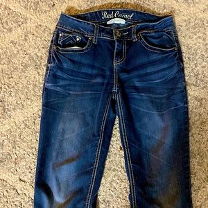 Red camel blue skinny jeans